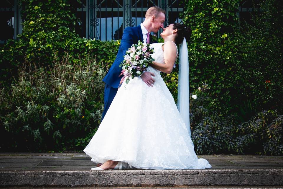 Bride and groom first kiss