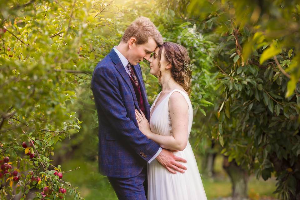 Bride and Groom amongst trees