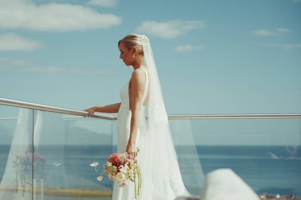 BRIDE ON BALCONY