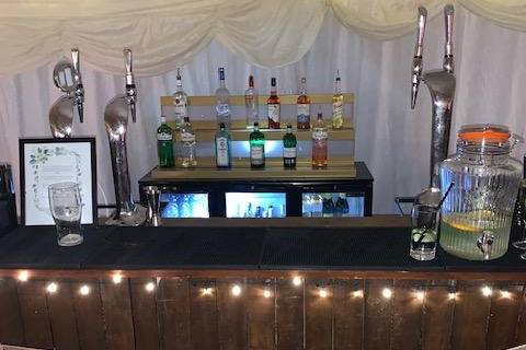 Dark oak bar set up