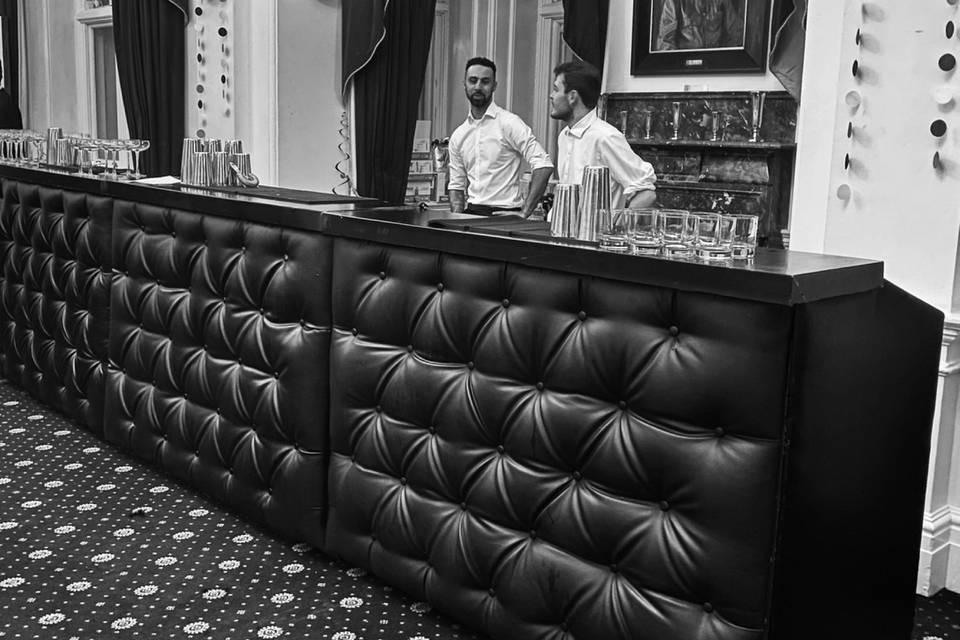 Black bar with cocktail team