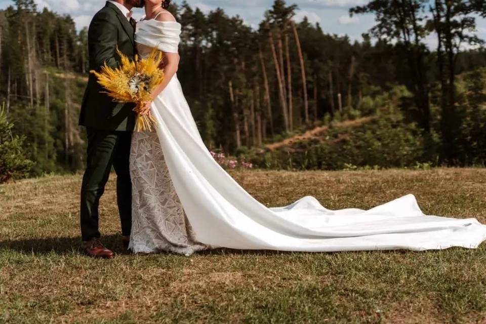 Wedding dress with a flowing train