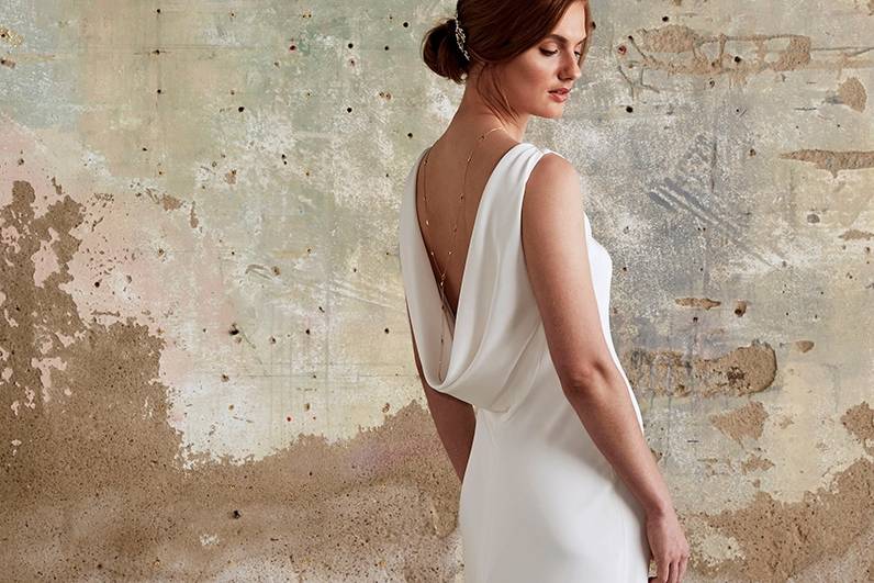 Draped back gown