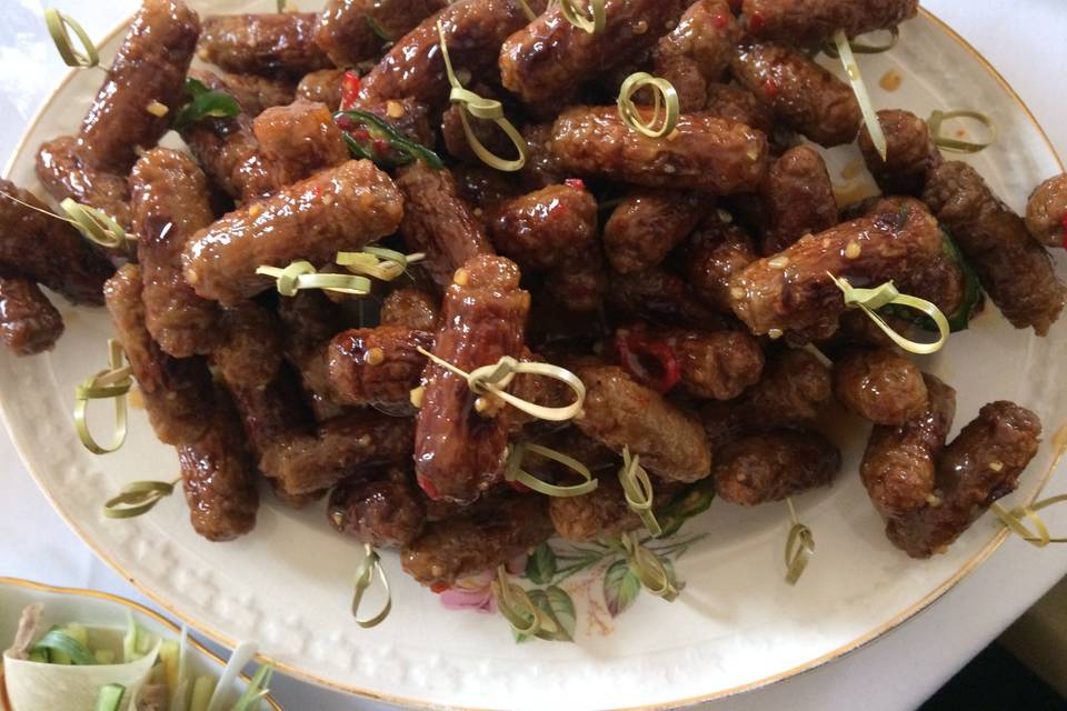 Sticky sesame sausages