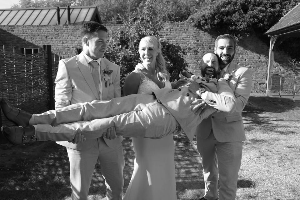 Lifting the groom