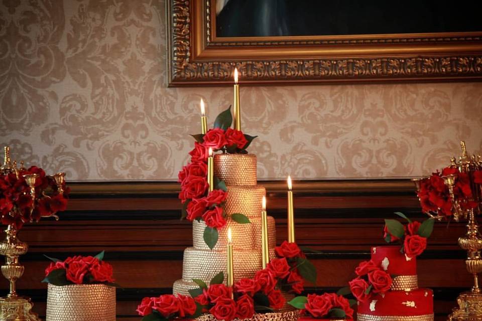 Cascading red cake florals