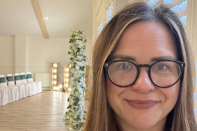 Emily Ayres at a wedding venue