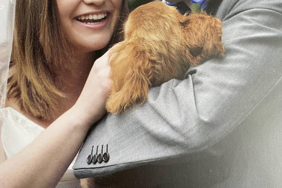 Bride and groom with their dog