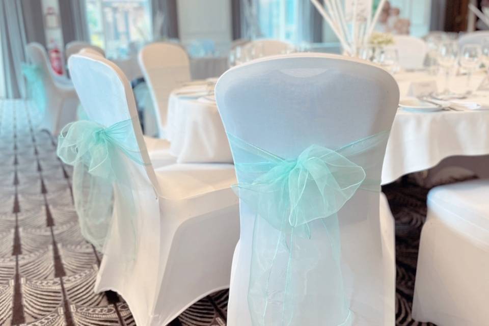 Chair covers with organza bows