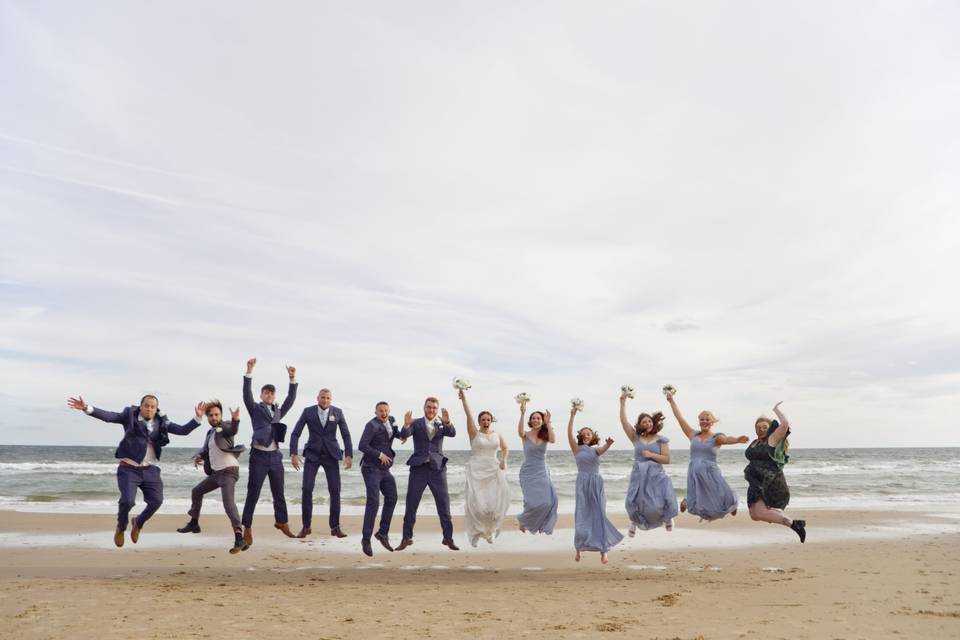 Group beach wedding picture