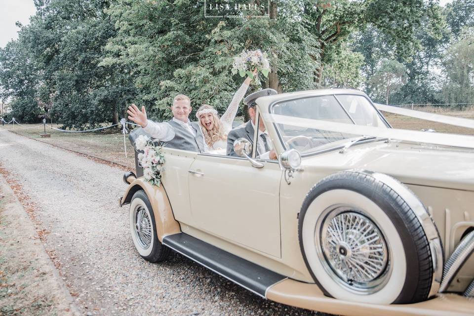 Couple in Beauford Wedding Car