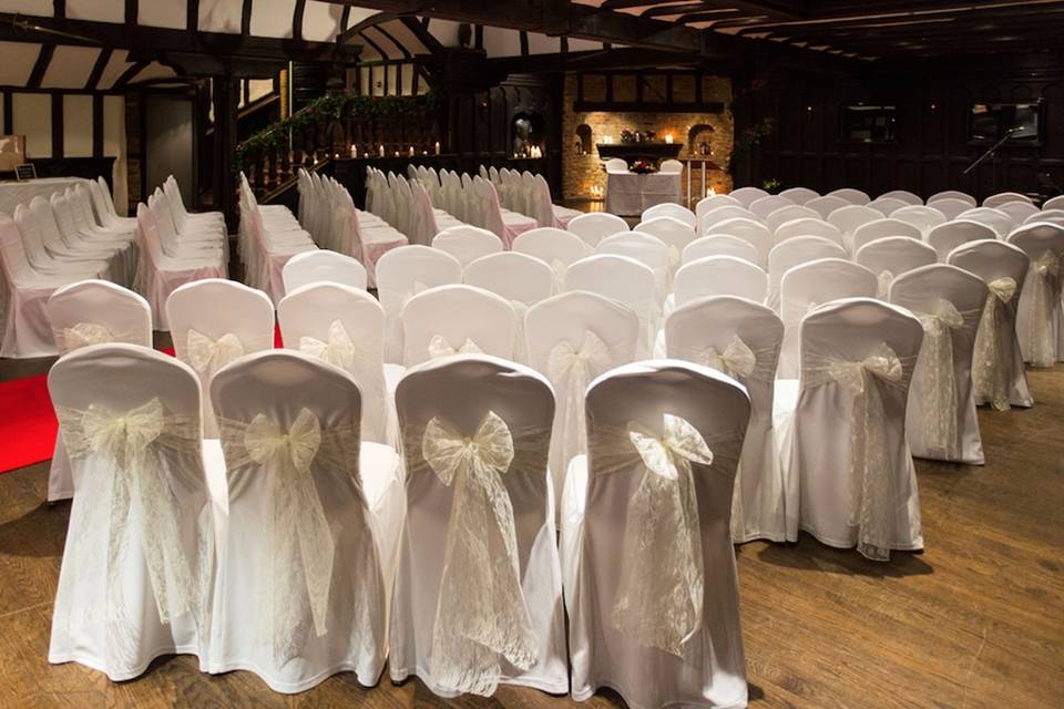 Ceremony in the Baronial Hall with red carpet