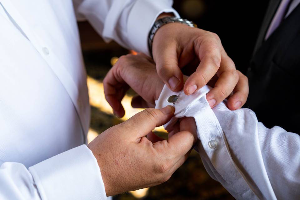 Cufflinks are a two-person job