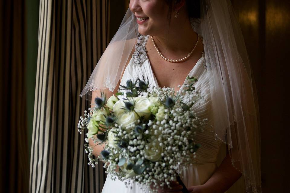 Holding bouquet