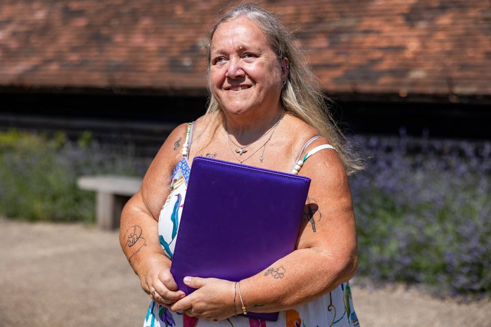Celebrant standing in garden grounds