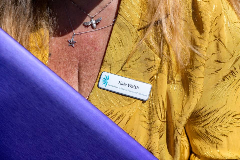 Detail of celebrant_s yellow blazer