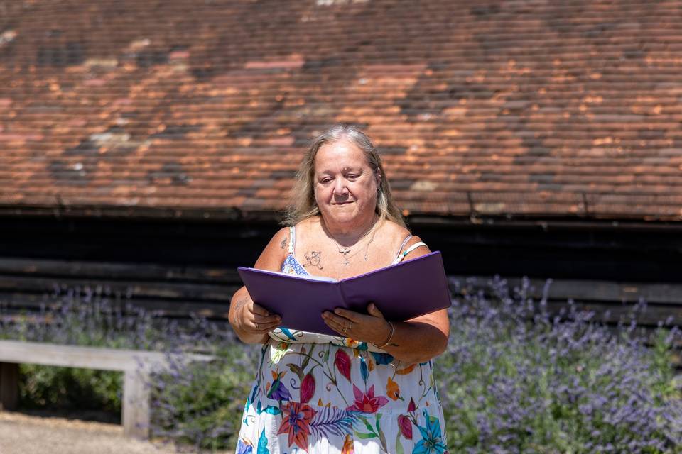 Portrait of celebrant with folder