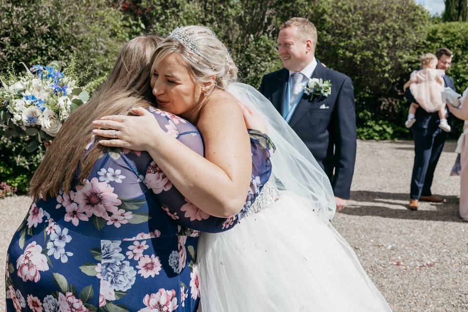 Hugs after a beautiful wedding