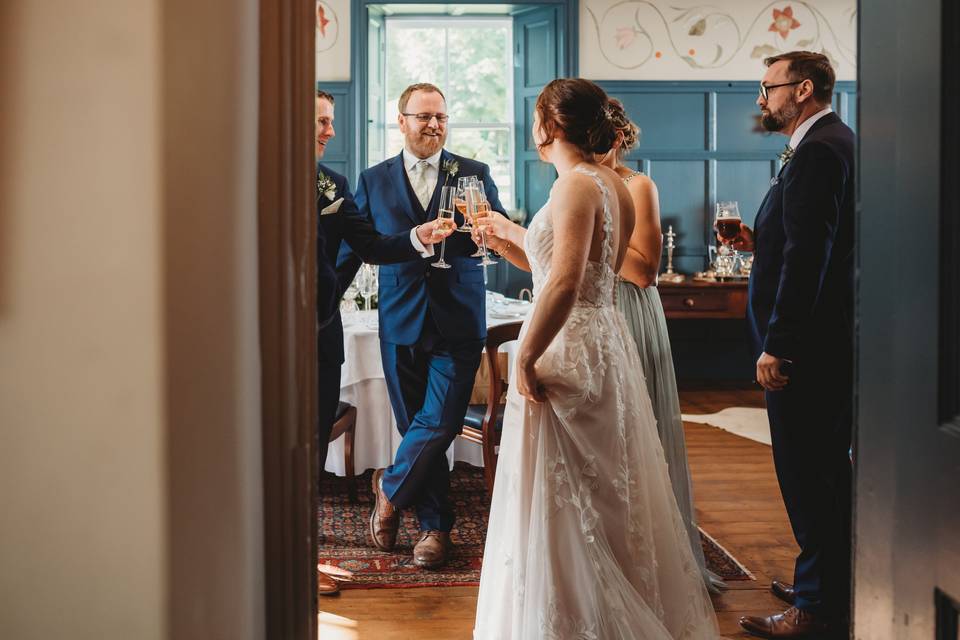 Sharing a toast in the Garden Room