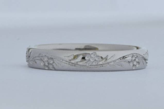 Hand engraved floral ring