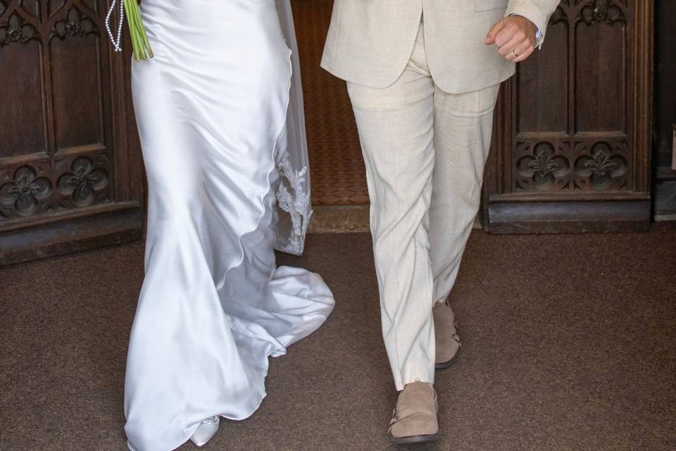 B & G married with bouquet
