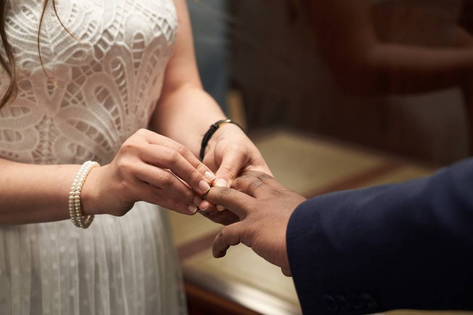 Couple exchanging rings