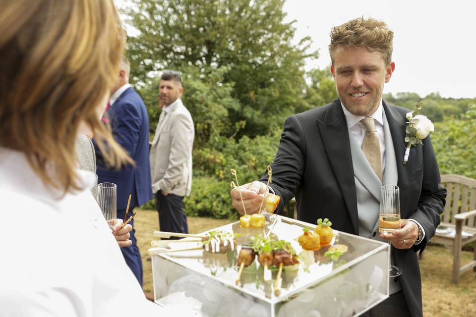 Groom and canapés
