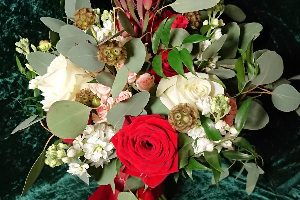 Bride hand tied posy red and i