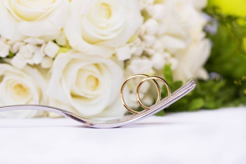 Wedding rings on a fork