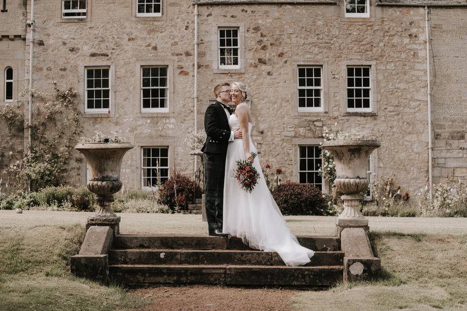 Couple outside venue