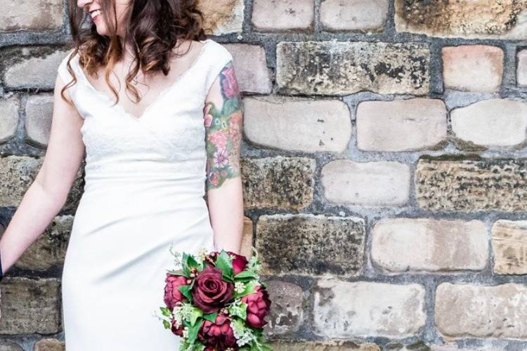 Holding a bouquet