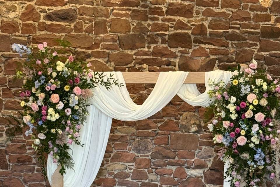Flowers added to chunky arch