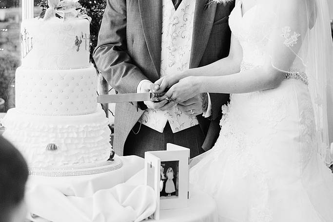 Bride and groom cake cutting