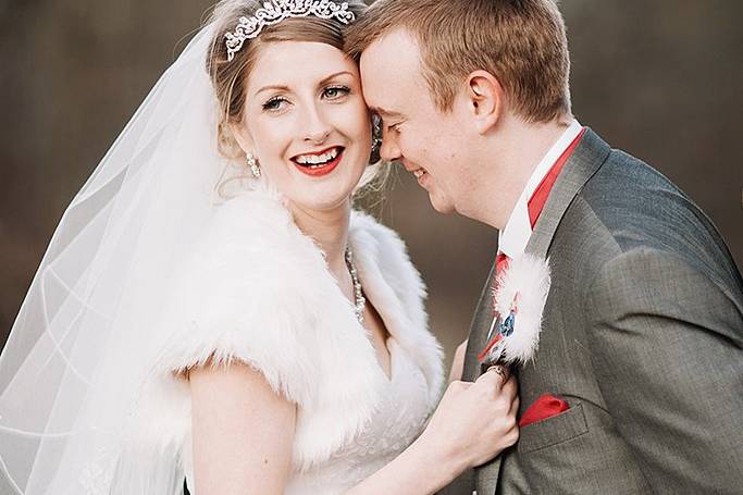 Playful bride and groom