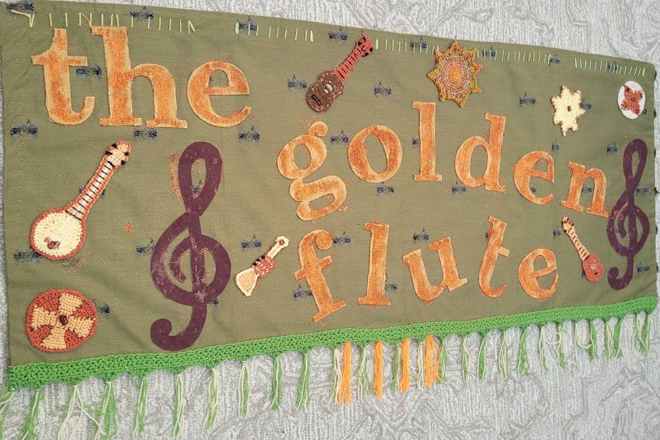 THE GOLDEN FLUTE BANNER