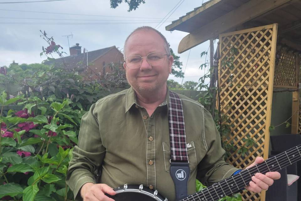 Banjo playing at home.