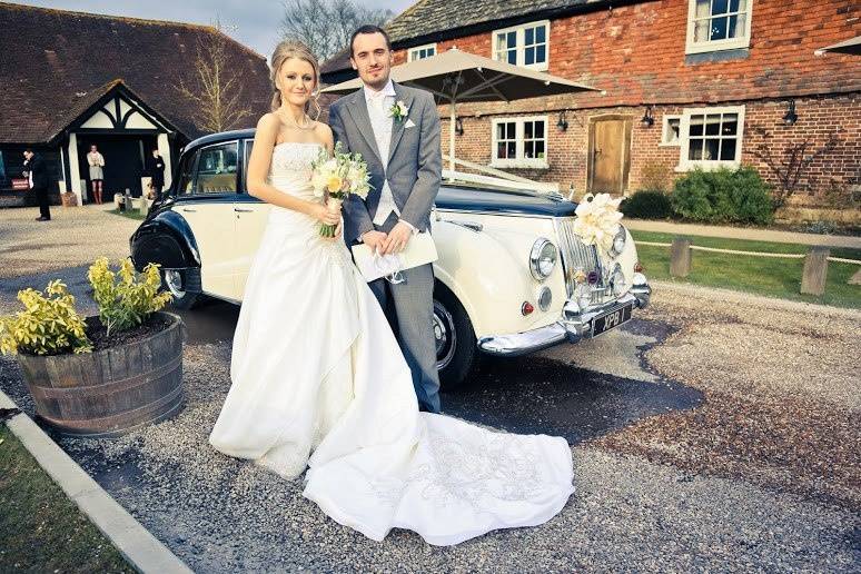 Happy Couple outside The Red Barn