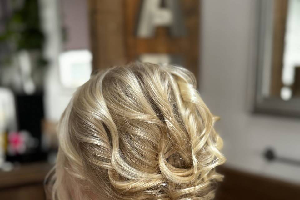 Low tousled updo in fine hair