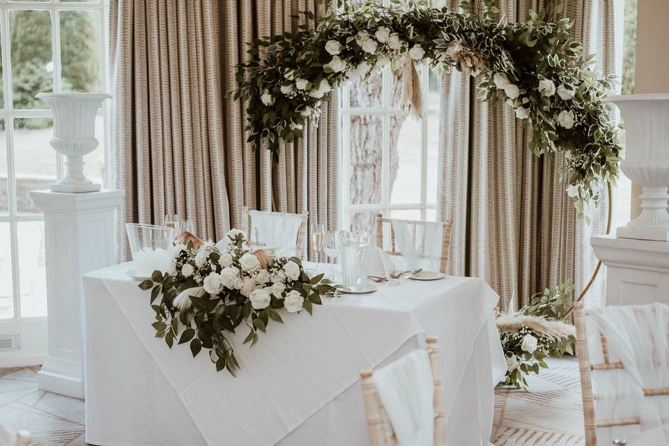 Sweetheart table and backdrop