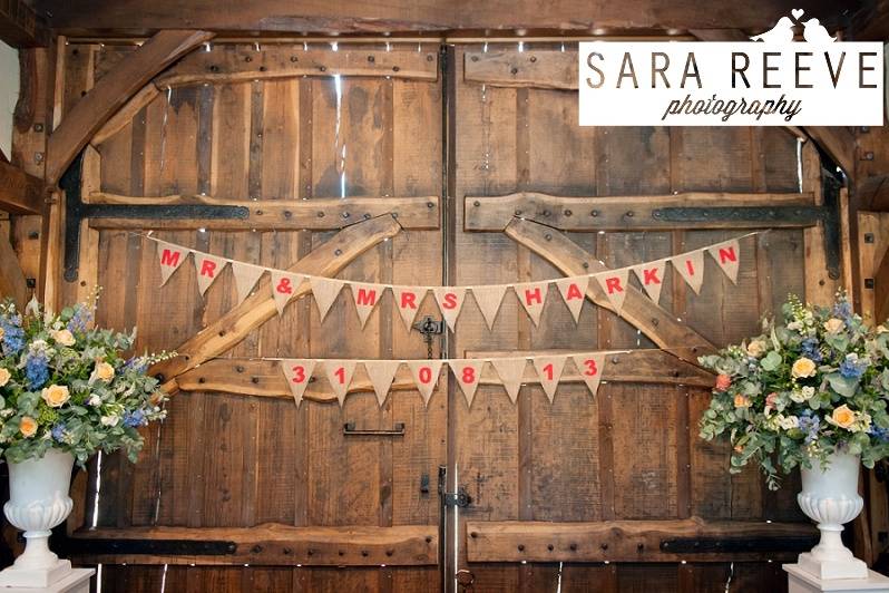 Rustic Oak Doors Behind Top Table