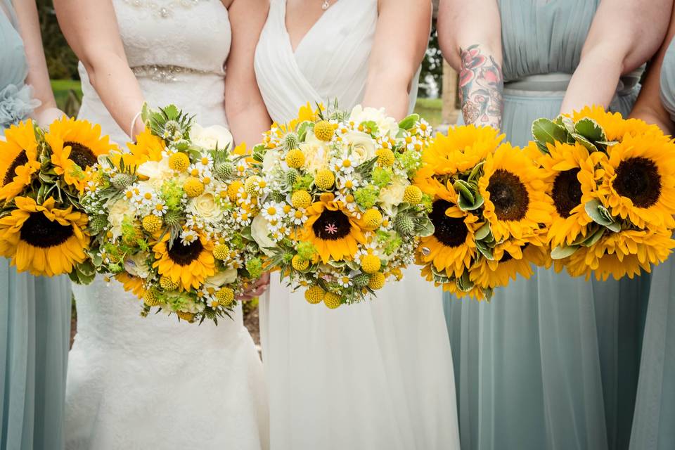 Bridal party with sunflowers