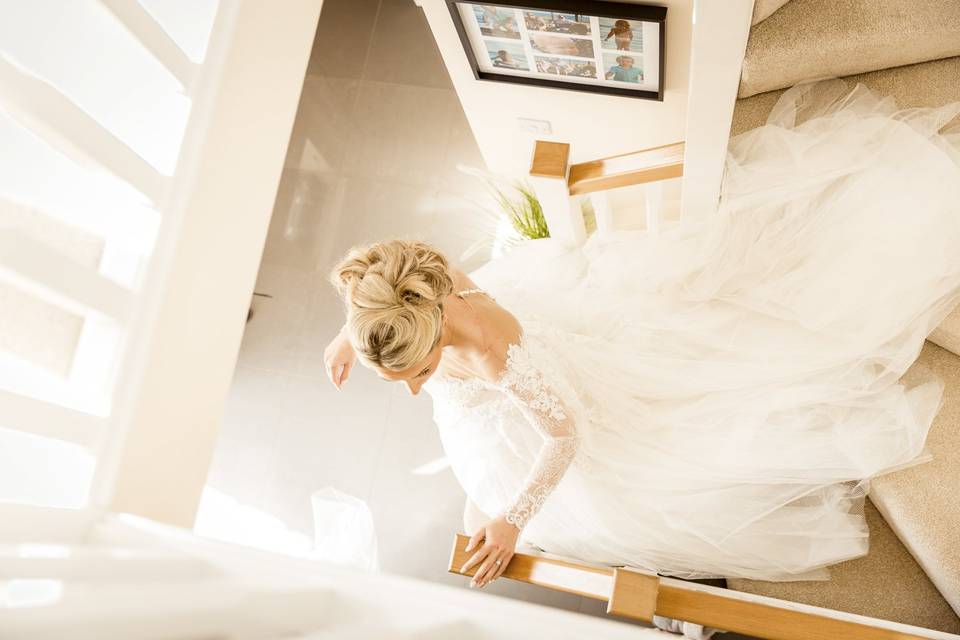 Bride on home staircase