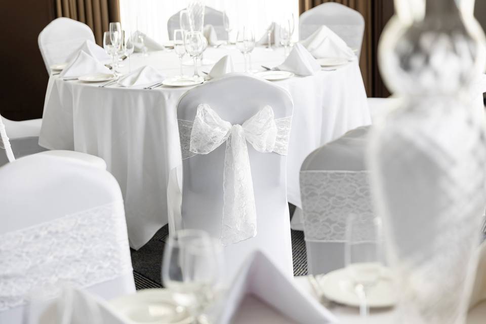 White lace sashes with bows