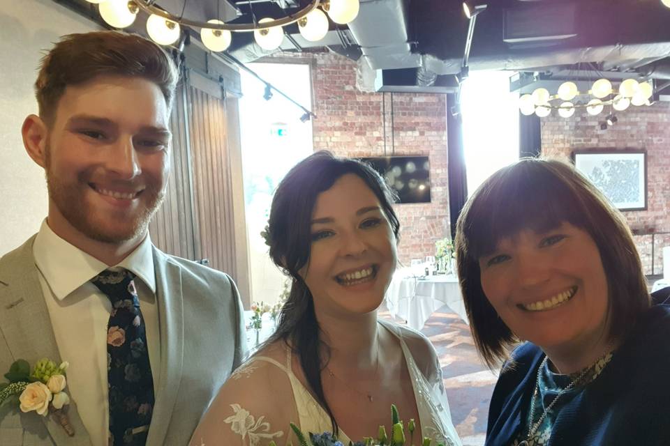 Wedding selfie with newlyweds