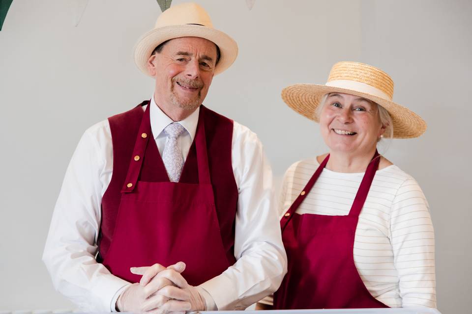 Two suitably attired attendants