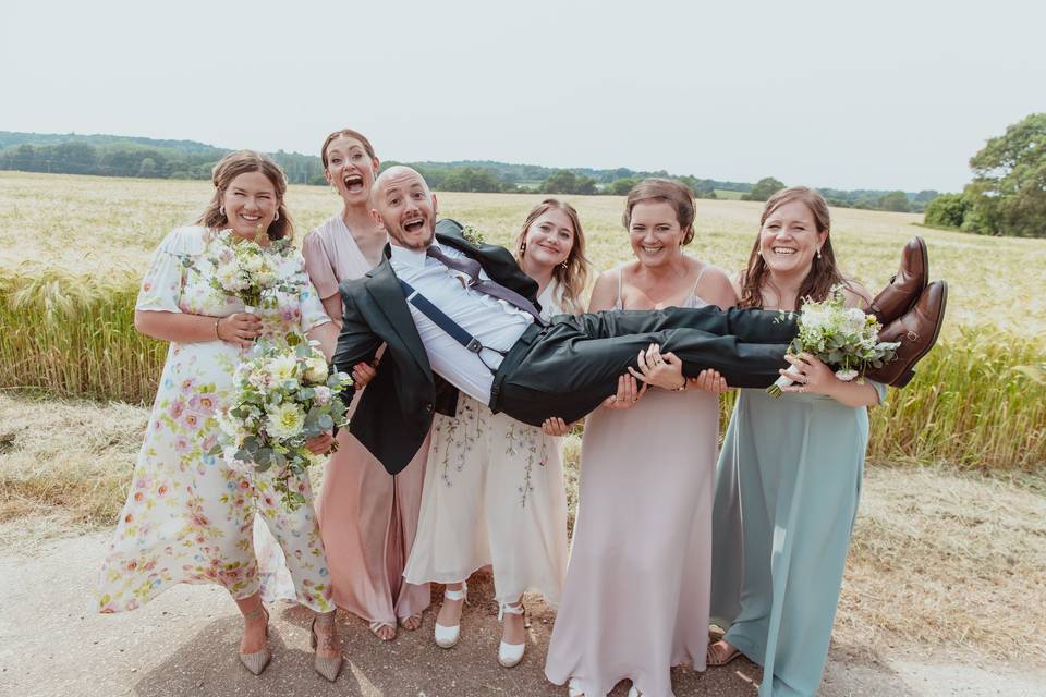 Holding the groom