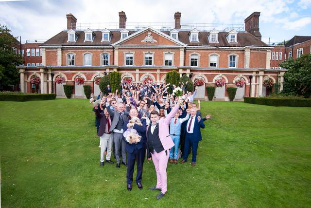Newlyweds and wedding guests