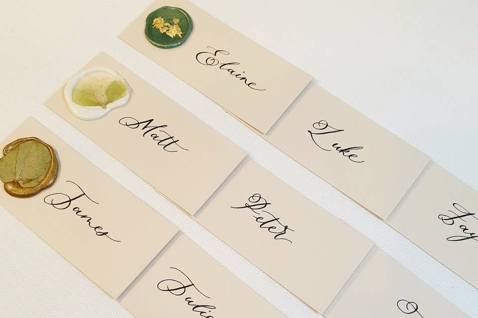 Place cards with wax seals