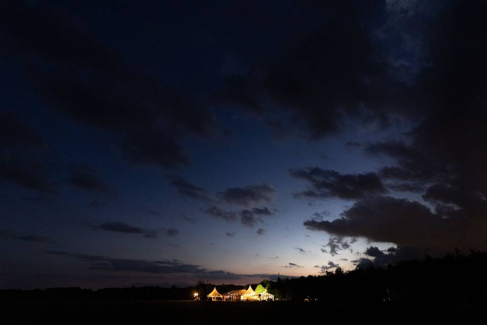 Night sky over marquee