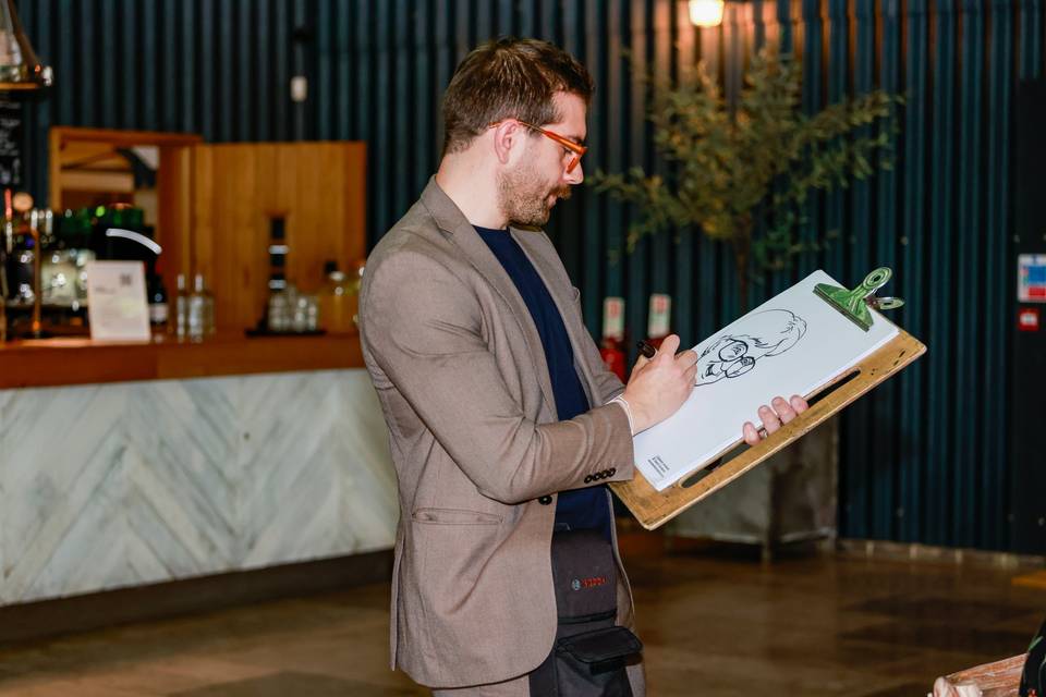 artist drawing in bar area